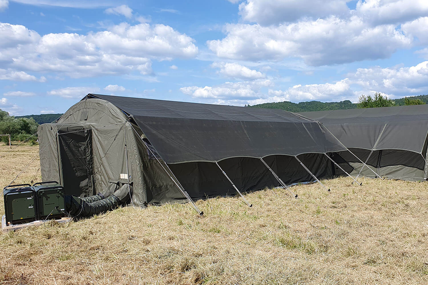 Rapid deploy inflatable military tent Nixus ERA with sun shade