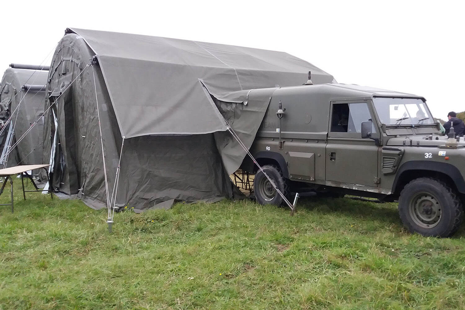 Rapid deploy heavy duty military tent Nixus PRO with a jeep